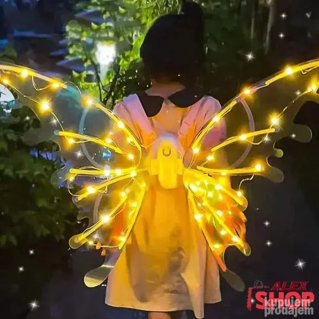 Velika svetleća krila leptira koja mašu i sviraju