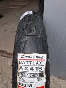 120 70 19 bridgestone ax41s Novo