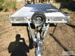 Najam prikolice za prevoz automobila slepka