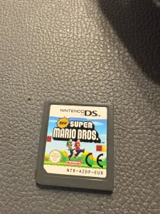 Igrica Super Mario Bros Nintendo plus torbica