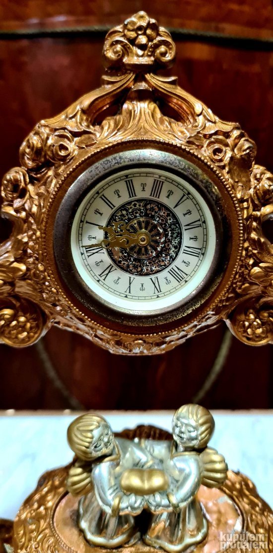 Prelep stari mehanicki bronzani komodni sat