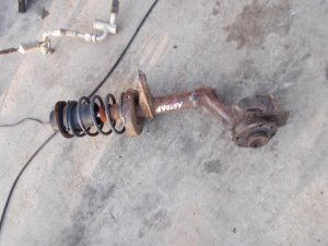 Astra F prednji amortizeri sa oprugom i glavcinom