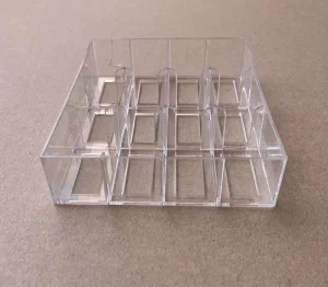 POSTOLJE plastično za 12 kutijica četkica za zube i sl.,novo