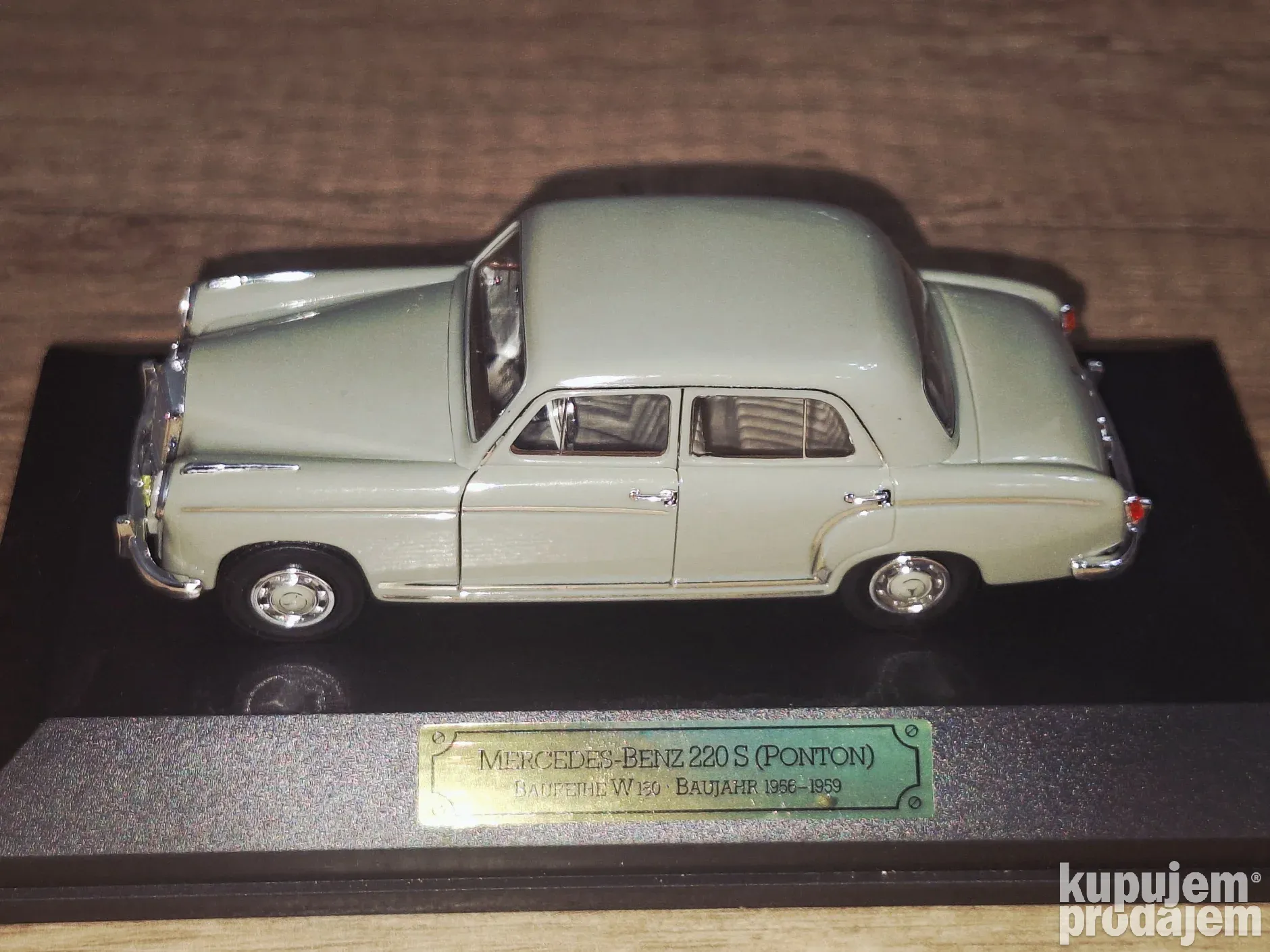 A collectible scale model Mercedes-Benz 220 SE Cabriolet from Faller