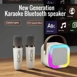 beli karaoke zvucnik sa mikrofonom za decake