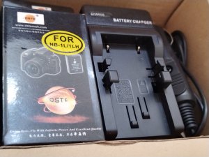 Dve nove baterije NB-1L/1LH + nov punjac (Canon)