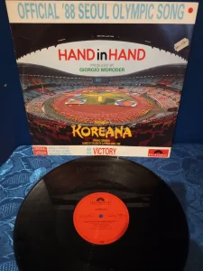 Giorgio Moroder - Hand In Hand