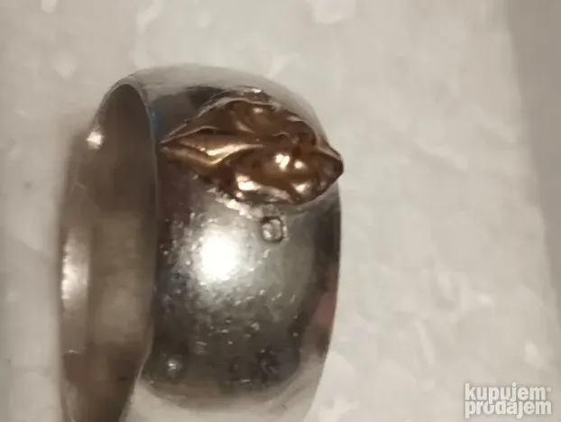 Srebrni prsten sa zlatnom aplikacijom 14kt-6.4gram