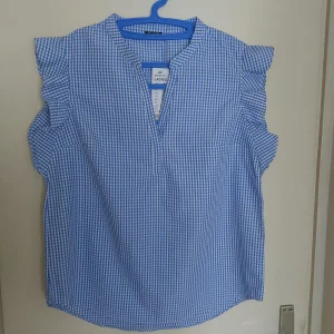 Ženska košulja Pepco 42 NOVA