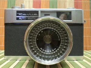 Revue AUTO-Matic Deluxe 2  Hexanon 1:2,8 f=40mm