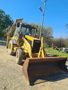 Kombinirka skip Cat 428 4x4