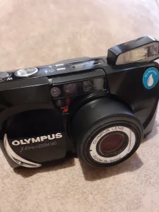 Olympus M(mju:)zoom 140 snizen sa 220e na 21000d