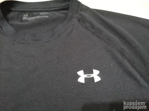 8143 - UNDER ARMOUR majica L/XL Org TOP