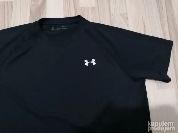8143 - UNDER ARMOUR majica L/XL Org TOP