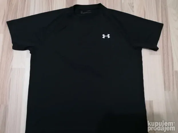 8143 - UNDER ARMOUR majica L/XL Org TOP