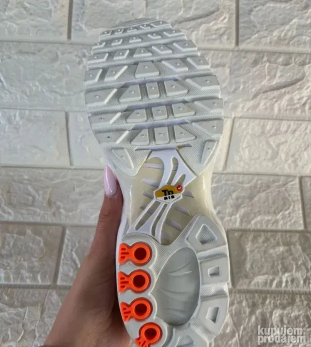 Nike TN Air Max Plus model White Pink Atomic