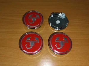 Cepovi za felne Abarth precnika 56/60mm. Novo.