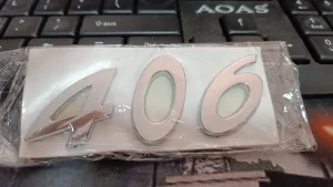 Natpis 406 oznaka znak Peugeot Pezo