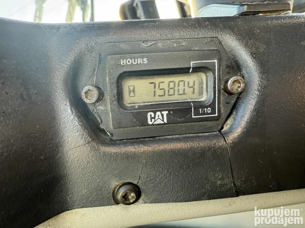 Utovarivač CAT 906
